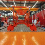 Ligne de soudage orange dans un atelier industriel